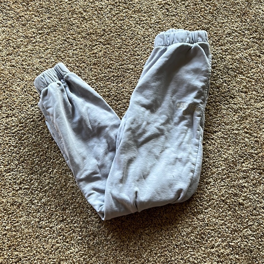 Women’s light purple sweatpants.